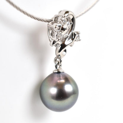 Tasaki necklace with one 9.3mm black pearl and six diamonds on white gold platinum chain