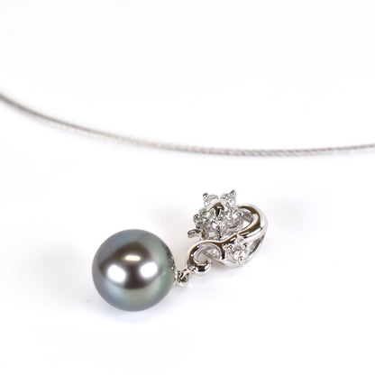 Tasaki necklace with one 9.3mm black pearl and six diamonds on white gold platinum chain