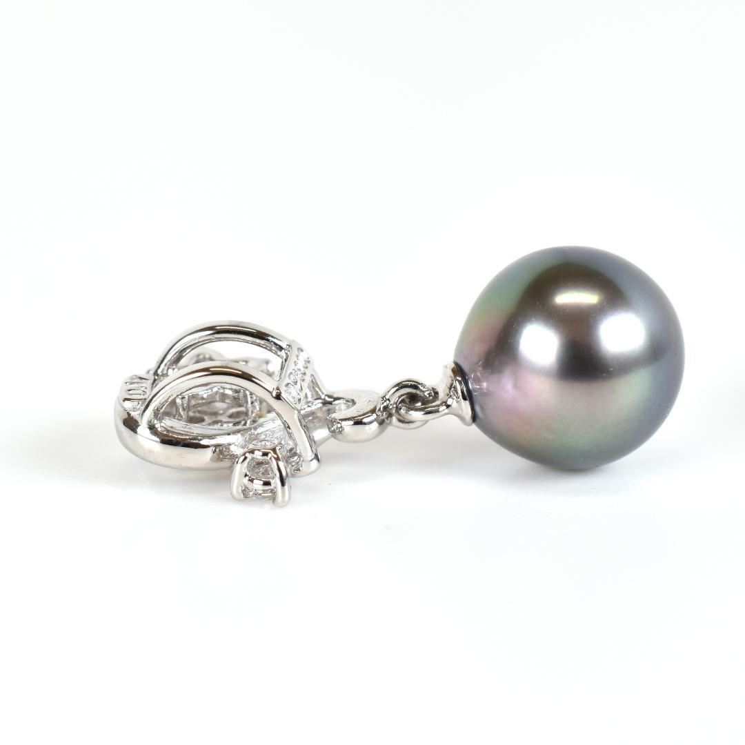 Tasaki necklace with one 9.3mm black pearl and six diamonds on white gold platinum chain
