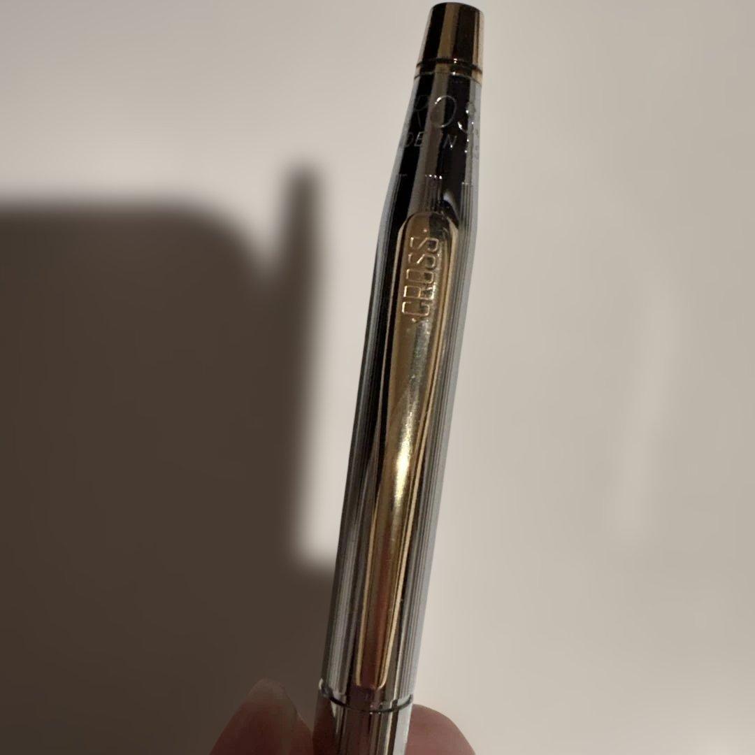 CROSS Classic Century Twist ballpoint pen in silver with gold accents shown with its case