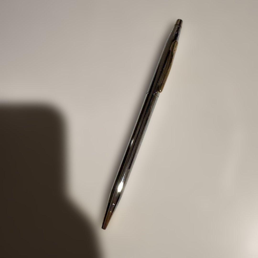 CROSS Classic Century Twist ballpoint pen in silver with gold accents shown with its case