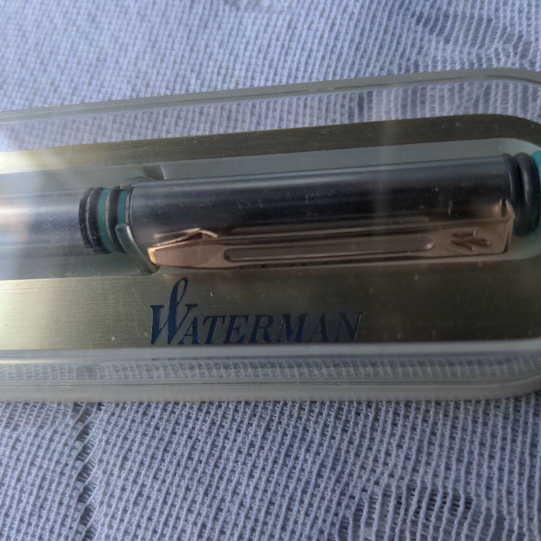 Retro WATERMAN ballpoint pen with 14cm length displayed alongside its vintage case