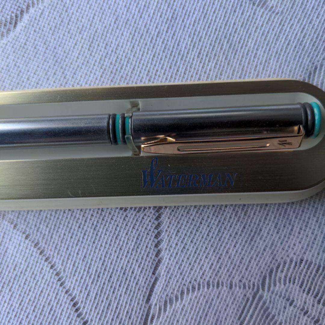 Retro WATERMAN ballpoint pen with 14cm length displayed alongside its vintage case