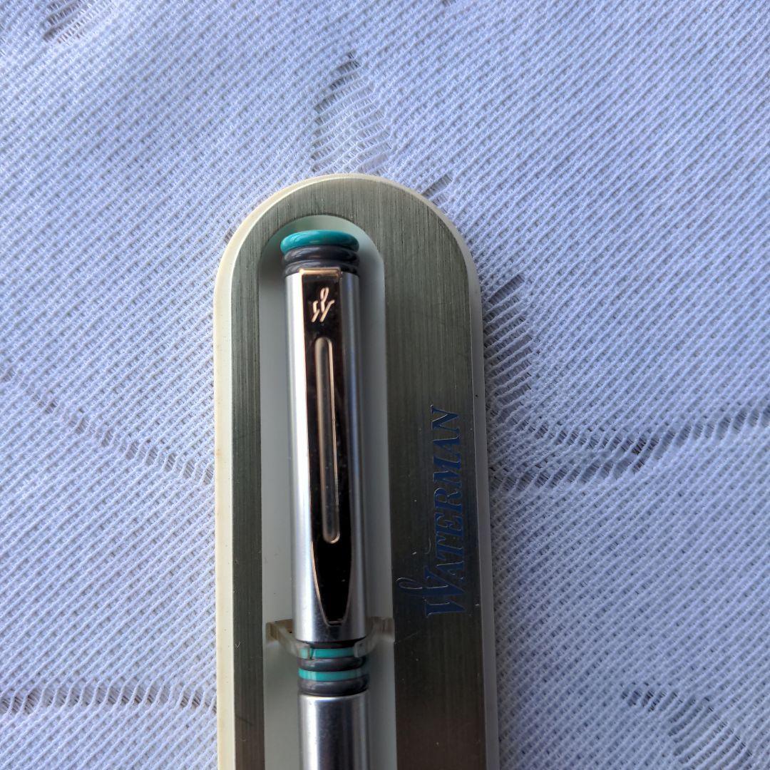 Retro WATERMAN ballpoint pen with 14cm length displayed alongside its vintage case