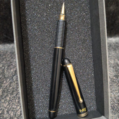 Rare K-BOS Pilot black resin ballpoint pen with gold parts and textured grip, vintage 1980s classic design
