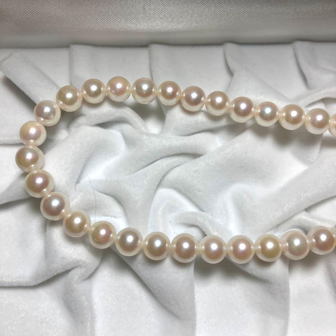 Akoya pearl necklace with 7.0-7.5mm pearls, 43 cm length, featuring a silver clasp