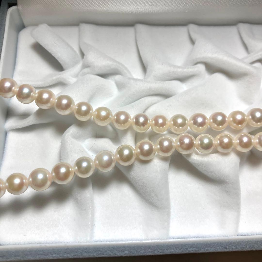Akoya pearl necklace with 7.0-7.5mm pearls, 43 cm length, featuring a silver clasp