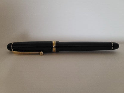 Pilot black fountain pen with 14K No 5 MS music nib, showing minor signs of use