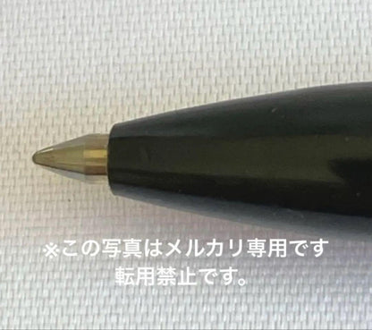 Waterman vintage ballpoint pen from 1970s with old logo on cap metal body showing light wear and scratches