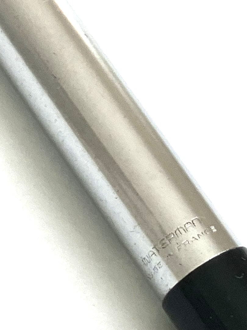 Waterman vintage ballpoint pen from 1970s with old logo on cap metal body showing light wear and scratches