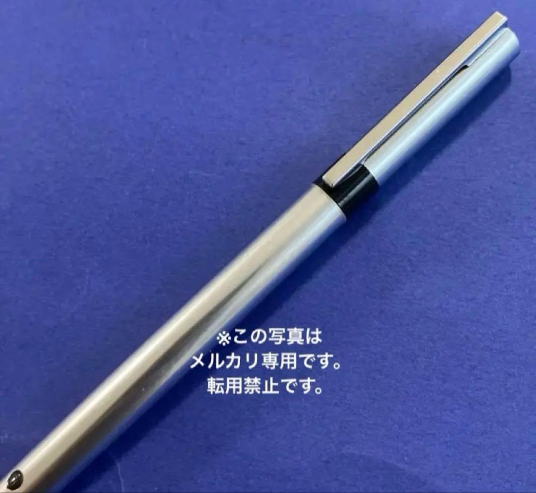 Waterman vintage ballpoint pen from 1970s with old logo on cap metal body showing light wear and scratches