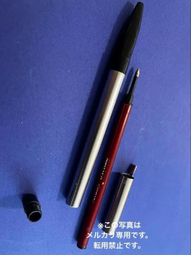 Waterman vintage ballpoint pen from 1970s with old logo on cap metal body showing light wear and scratches