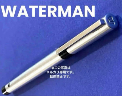 Waterman vintage ballpoint pen from 1970s with old logo on cap metal body showing light wear and scratches