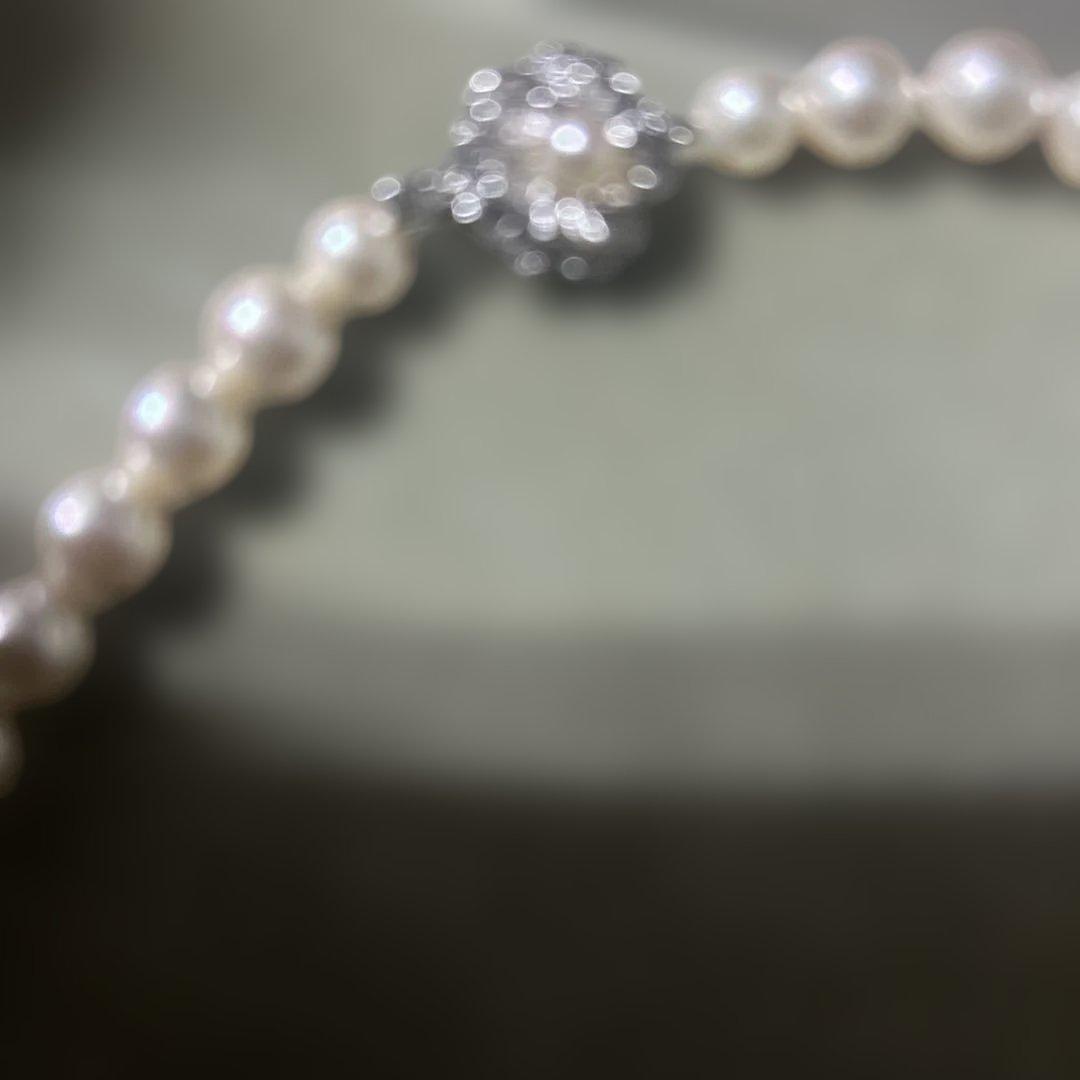 Akoya pearl necklace with 7mm pearls and removable silver clicker clasp in simple elegant design