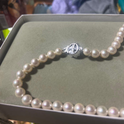 Akoya pearl necklace with 7mm pearls and removable silver clicker clasp in simple elegant design