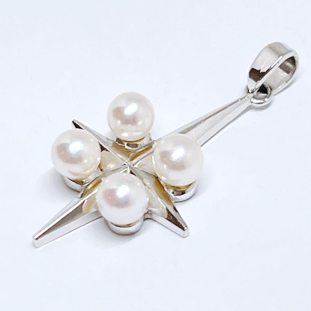Mikimoto silver pendant necklace with four round pearls and a cross design
