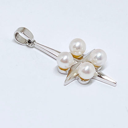 Mikimoto silver pendant necklace with four round pearls and a cross design