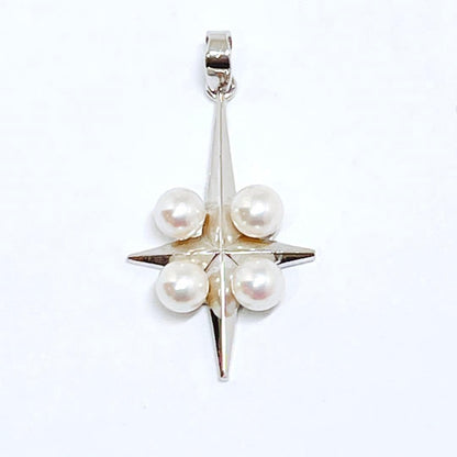 Mikimoto silver pendant necklace with four round pearls and a cross design