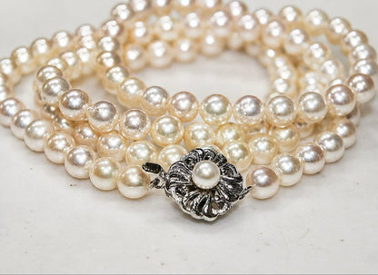 Akoya pearl long necklace with 7.0-7.22 mm pearls measuring 84 cm, displayed on a white background