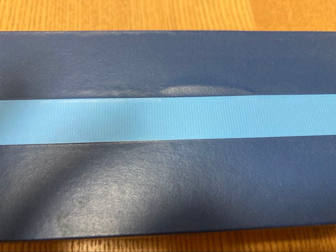 WATERMAN ballpoint pen with engraved organization name on the body, shown in close-up