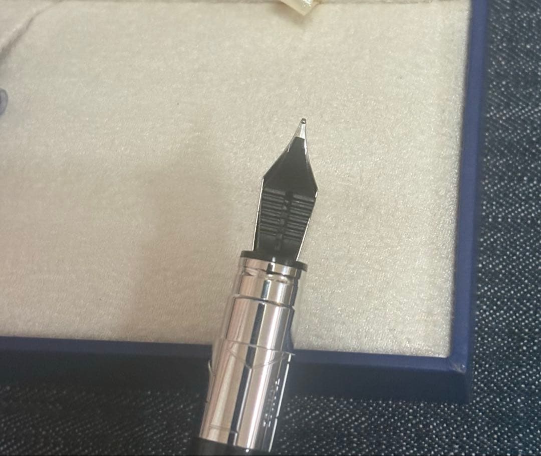 Waterman Perspectiv fountain pen with black body, silver trim, fine nib, and included case and ink cartridges
