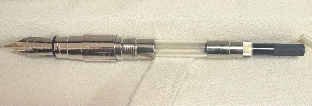 Waterman Perspectiv fountain pen with black body, silver trim, fine nib, and included case and ink cartridges