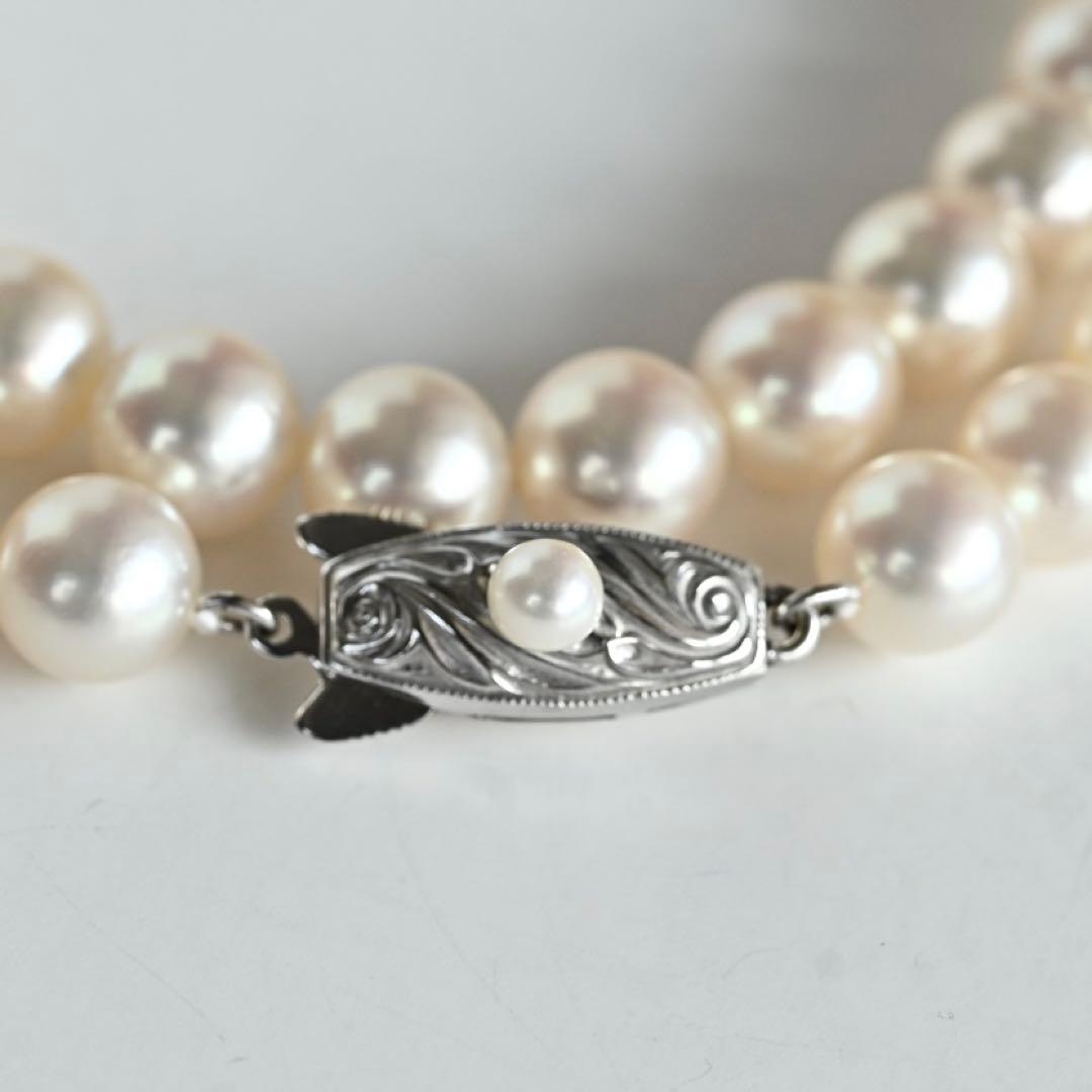Takashi Akoya pearl necklace with 7.5mm round pearls and a K14 gold fastener on a white background