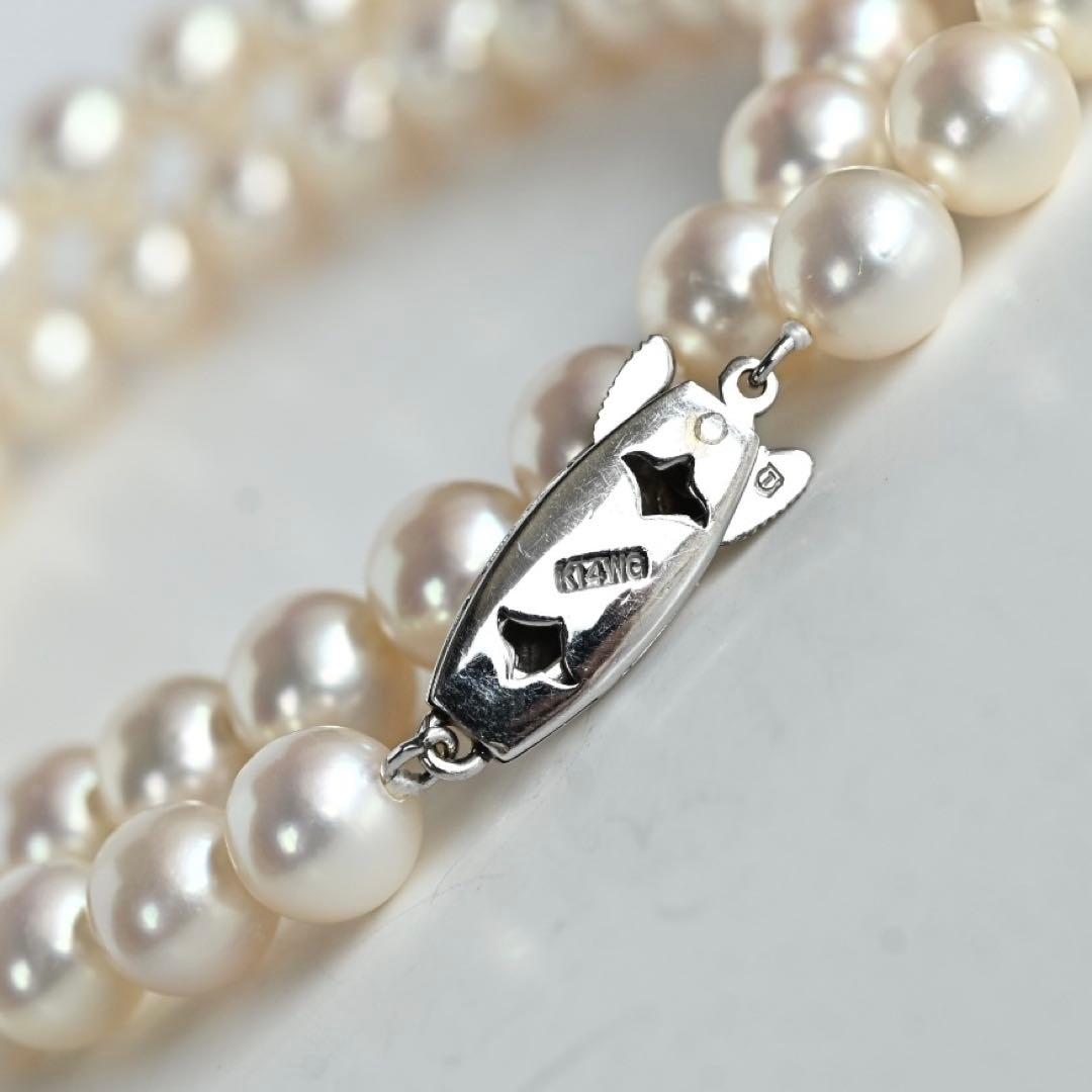 Takashi Akoya pearl necklace with 7.5mm round pearls and a K14 gold fastener on a white background