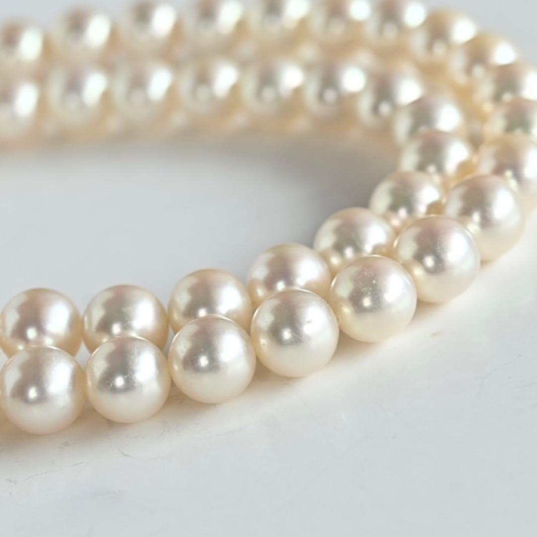 Takashi Akoya pearl necklace with 7.5mm round pearls and a K14 gold fastener on a white background