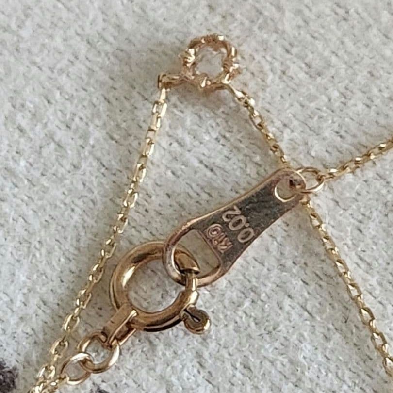 Law Rose Cut Diamond Necklace in K10 gold featuring a single 0.02 carat diamond