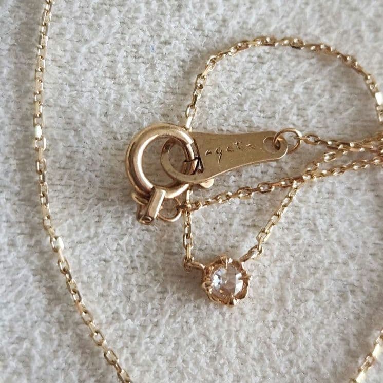 Law Rose Cut Diamond Necklace in K10 gold featuring a single 0.02 carat diamond