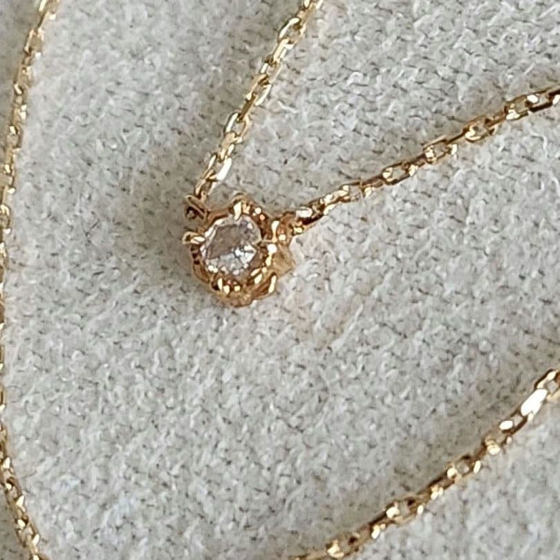Law Rose Cut Diamond Necklace in K10 gold featuring a single 0.02 carat diamond