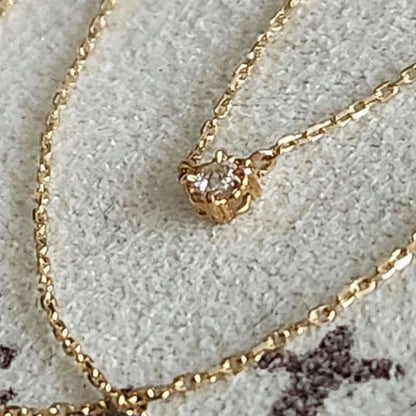 Law Rose Cut Diamond Necklace in K10 gold featuring a single 0.02 carat diamond
