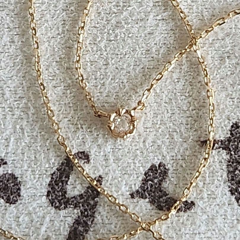 Law Rose Cut Diamond Necklace in K10 gold featuring a single 0.02 carat diamond