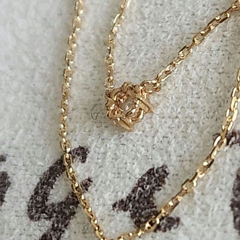 Law Rose Cut Diamond Necklace in K10 gold featuring a single 0.02 carat diamond