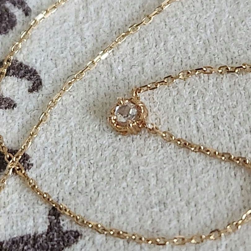 Law Rose Cut Diamond Necklace in K10 gold featuring a single 0.02 carat diamond
