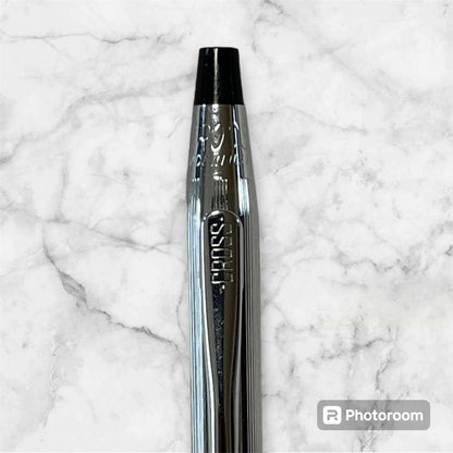 Silver Cross mechanical pencil and ballpoint pen set with rotating mechanism showing slight wear
