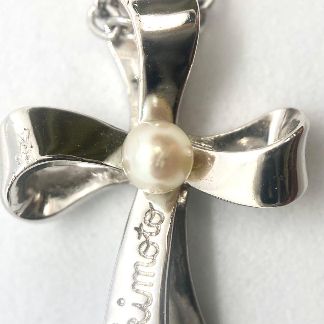 MIKIMOTO Kuro Ribbon Cross Pearl Necklace with silver chain and cross-shaped pearl pendant