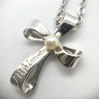 MIKIMOTO Kuro Ribbon Cross Pearl Necklace with silver chain and cross-shaped pearl pendant