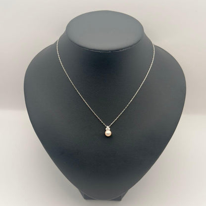 Mikimoto K18WG necklace featuring 6.7mm diamond pearl, 39cm length, displayed on white background