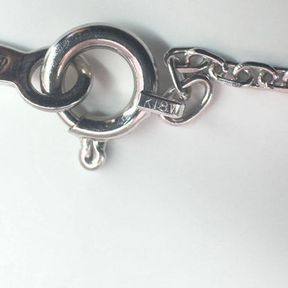 Mikimoto K18WG necklace featuring 6.7mm diamond pearl, 39cm length, displayed on white background