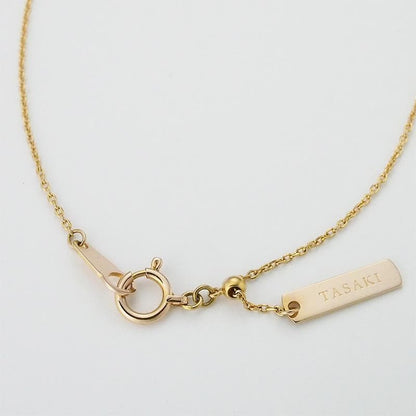 Tasaki K18 Sakura Gold 3P Pearl Necklace with three pearls and gold chain on white background