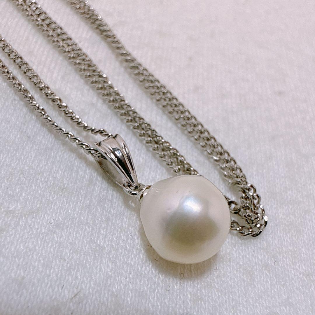 Tasaki necklace featuring a 7.8mm pearl pendant with silver material on a 40cm metal chain