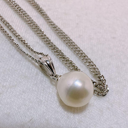 Tasaki necklace featuring a 7.8mm pearl pendant with silver material on a 40cm metal chain