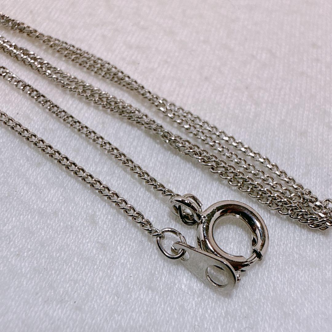 Tasaki necklace featuring a 7.8mm pearl pendant with silver material on a 40cm metal chain