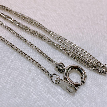 Tasaki necklace featuring a 7.8mm pearl pendant with silver material on a 40cm metal chain