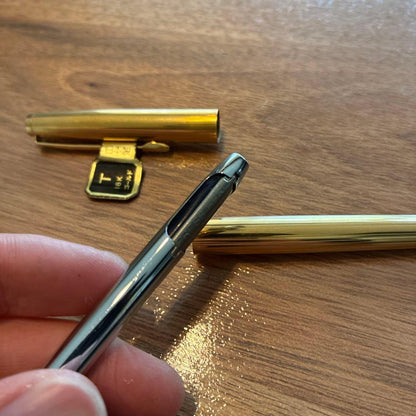 New PILOT fountain pen featuring an 18K gold nib with sleek black body and silver accents