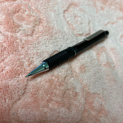 Pilot GIMNO Black pen featuring metal tip, rubber grip, and simple black plastic and metal body