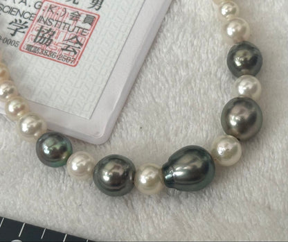 Silver necklace with 7.9-10mm Black Lip South Sea and Akoya pearls, 43.5cm length, displayed on white background