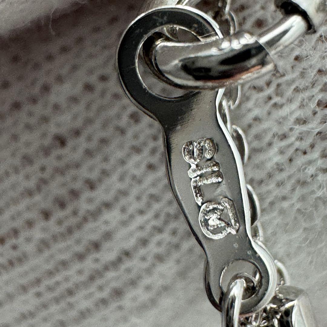 Mikimoto Akoya pearl necklace with silver teardrop pendant, silver chain, and red storage box